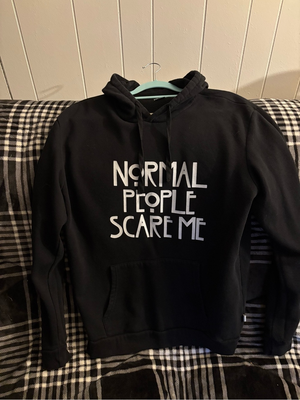 Black Graphic Hoodie with 'Normal People Scare Me' Slogan